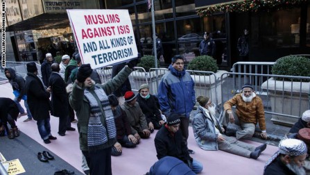 A group of Muslims pray and attend a rally in front of Trump Tower December 20, 2015 in New York. Republican presidential hopeful Donald Trump proposed a call for a ban on Muslims entering the United States. AFP PHOTO/KENA BETANCUR / AFP / KENA BETANCUR        (Photo credit should read KENA BETANCUR/AFP/Getty Images)