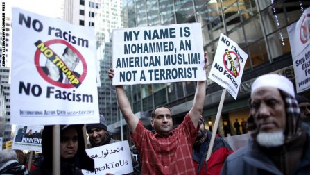 A group of Muslims take part in a rally in front of Trump Tower December 20, 2015 in New York. Republican presidential hopeful Donald Trump proposed a call for a ban on Muslims entering the United States. AFP PHOTO/KENA BETANCUR / AFP / KENA BETANCUR        (Photo credit should read KENA BETANCUR/AFP/Getty Images)